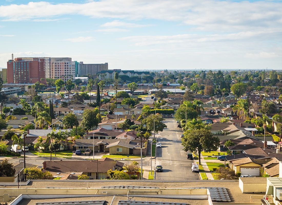 Anaheim, CA - Aerial View of Quiet Residential Neighborhood with Homes Surrounded by Green Trees in the Suburbs of Anaheim in California on a Sunny Day